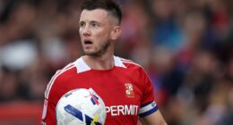 Footballer banned for 'violating rival's private parts', leaving him unable to speak, PLAYS in match despite seven-game suspension - as rules loophole sparks bizarre row