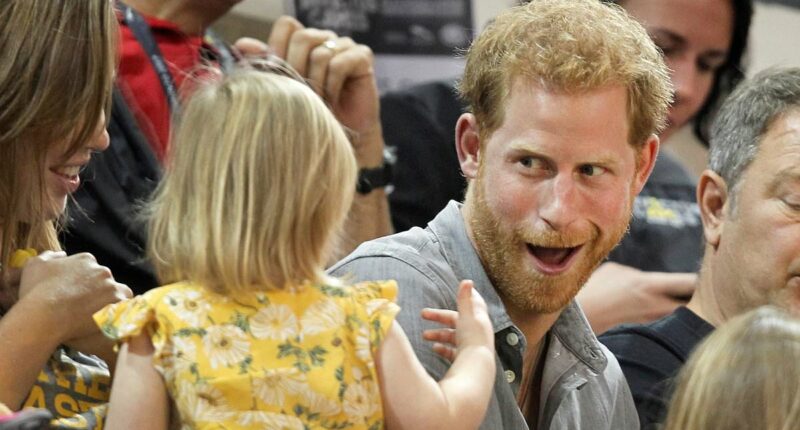 How fun-loving Prince Harry pretended not to notice when an adorable two-year-old helped herself to the royal's food - showing us all what a great dad he would be
