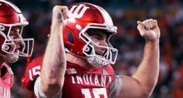 Indiana completes undefeated season and wins first national title, beating Miami 27-21 in CFP final