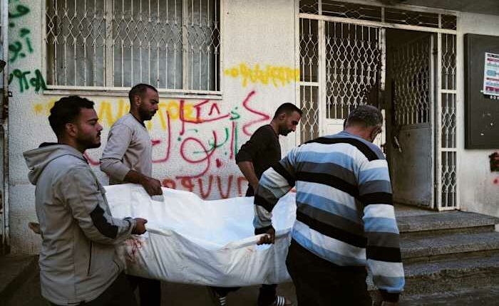 Israeli strikes kill at least 13 across Gaza, as Trump is expected to announce Board of Peace