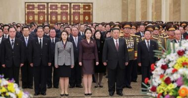 In this photo provided by the North Korean government, leader Kim Jong Un, center right, his wife Ri Sol Ju, third left, and their daughter, center, believed to be named Kim Ju Ae, visit Kumsusan Palace of the Sun in Pyongyang, North Korea, Thursday, Jan. 1, 2026.