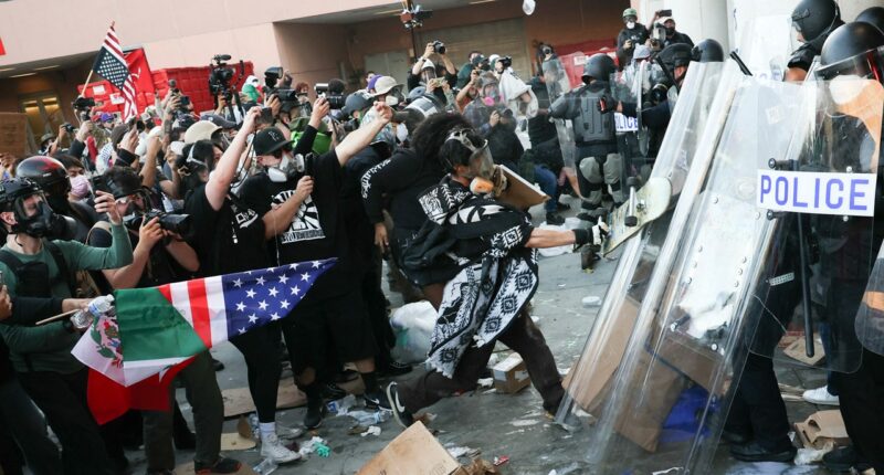 LAPD arrests violent agitators after protests erupt outside federal detention center in Los Angeles