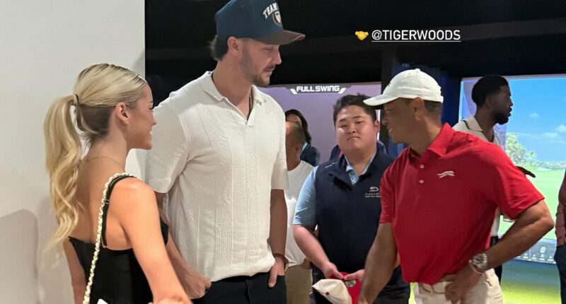 Livvy Dunne and Paul Skenes cozy up to Tiger Woods at golf event