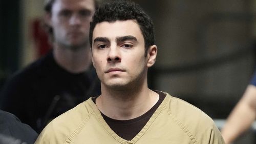 Luigi Mangione is escorted into Manhattan state court in New York