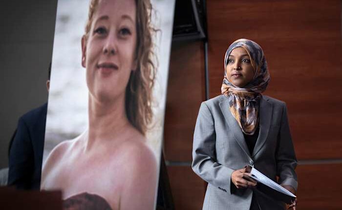 Man sprays unknown substance on Rep. Ilhan Omar and is tackled at Minneapolis town hall