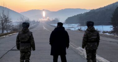 North Korea test-launches hypersonic missile system in front of Kim, nation says