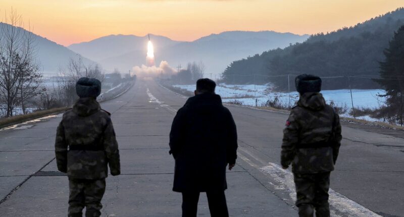 North Korea test-launches hypersonic missile system in front of Kim, nation says