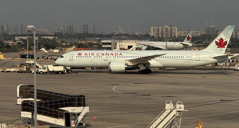 Passengers baffled and confused after screams burst from beneath taxiing Air Canada plane