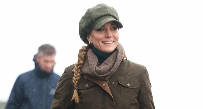 Plait's a great look, Kate! Princess unveils a new fuss-free DIY hairdo as she gathers her tresses into neat braid during rugby club visit