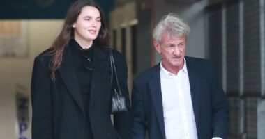 Sean Penn reemerges with younger lover after bad behavior at Globes