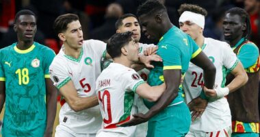 Senegal win AFCON after football's most dramatic final: Morocco star misses late penalty that sparked walk-off protest from Sadio Mane and Co, as riot police are forced to contain angry fans in ugly scenes