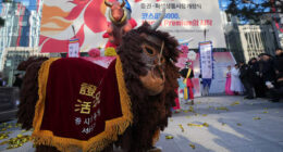 Shares climb in Asia, and South Korea's Kospi hits a record close, in an upbeat start to 2025