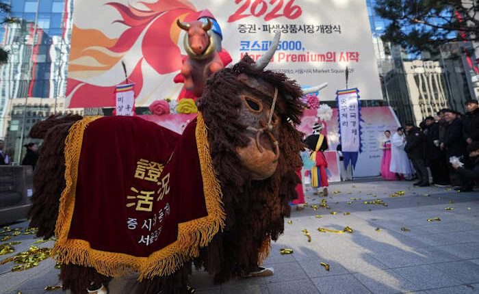 Shares climb in Asia, and South Korea's Kospi hits a record close, in an upbeat start to 2025