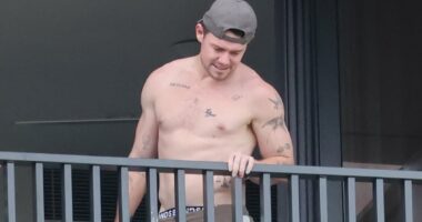 Shirtless and smiling Lachie Neale enjoys a housewarming at his new bachelor pad... as he faces the toughest call of his career