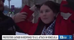 Shocking moment woman is arrested during live TV interview