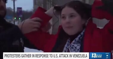 Shocking moment woman is arrested during live TV interview