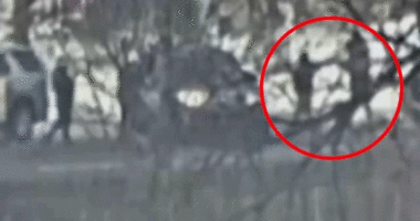 Surveillance footage shows immigration activist blocking road before fatal ICE shooting