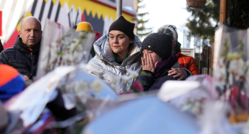 Swiss investigators believe sparkling flares atop wine bottles ignited fatal bar fire