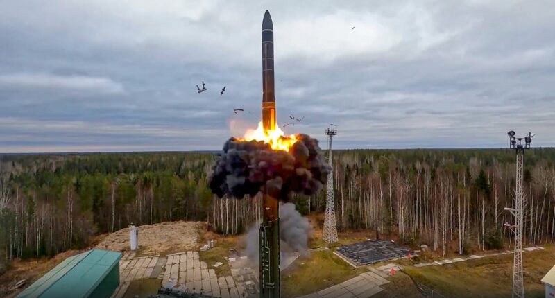 The world goes nuclear: Countries that are next in line to arm themselves with nukes as superpowers teeter on the brink of WW3