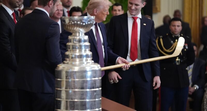 Trump receives golden gift from defending hockey champs