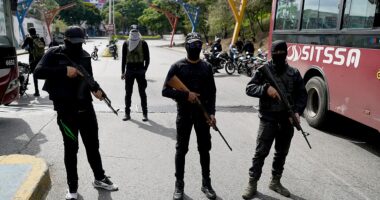 US warns Americans to leave Venezuela immediately as armed militias set up roadblocks