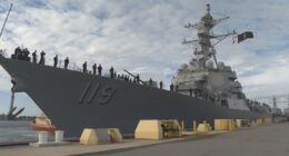 USS Delbert D. Black deploys from Mayport amid global tension; sailors' families say emotional goodbyes