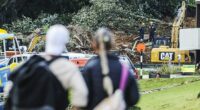 Up to nine people are missing after a landslide hit campervans and a shower block at the Mount Maunganui Beachside Holiday Park in New Zealand's North Island on Thursday