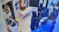 Video shows moment masked California burglars blitz high-end store, escape in luxury SUVs