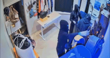 Video shows moment masked California burglars blitz high-end store, escape in luxury SUVs