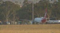 Gusts of up to 72km/h near the airport forced flight QF691 to divert to the Edinburgh RAAF base