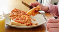 'Lower cholesterol' and 'protect the heart' with beans on toast - but there's a catch