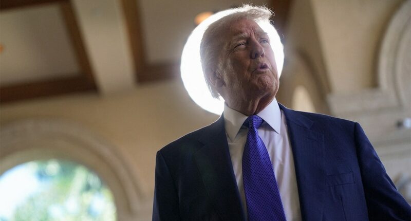 Agitator arrested on battery charge outside Trump's West Palm Beach golf course