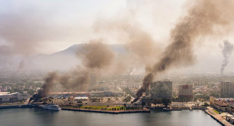 Americans trapped in Mexico as cartel violence kills 14