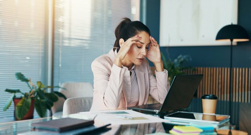 Are you suffering from 'emotional exhaustion'? Top psychologist reveals easy-to-dismiss signs of condition that could take years off your life