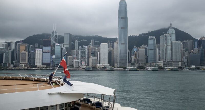 Asia markets trade mixed after Trump revives tariff threat and AI fears hit tech