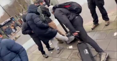 Christian preacher is pushed and has equipment attacked by Muslim men