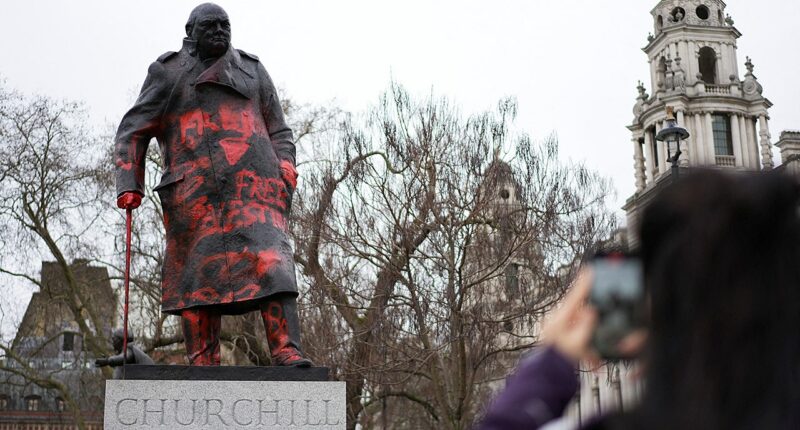 Churchill statue in London defaced with anti-Israel messages