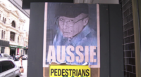 Poster of man accused of throwing hot coffee on baby in Brisbane on Chapel Street