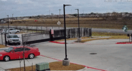 A man was seen running after a repossessed car, opening fire.