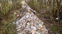 Fly-tippers dump 100ft river of rubbish near dual carriageway
