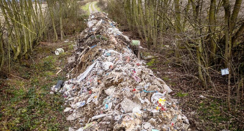 Fly-tippers dump 100ft river of rubbish near dual carriageway