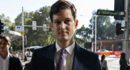 Former MP on trial for alleged child abuse in car park bathroom