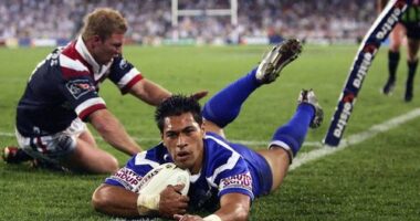 SYDNEY, AUSTRALIA - OCTOBER 3: Matt Utai of the Bulldogs dives over for a try during the NRL Grand Final  between the Sydney Roosters and the Bulldogs held at Telstra Stadium, October 3, 2004 in Sydney, Australia. (Photo by Chris McGrath/Getty Images) *** Local Caption *** Matt Utai