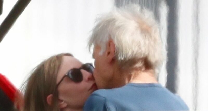 Harrison Ford and Calista Flockhart kiss on tarmac as they land in LA