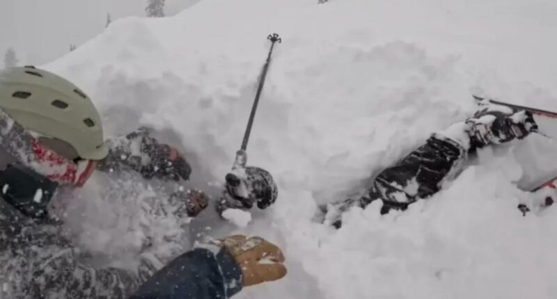 Heart stopping moment skier is rescued after being buried alive under mount of snow in Lake Tahoe