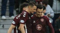 Hearts defeat Falkirk to go five clear at the top but McInnes urges his side to sort out their defence