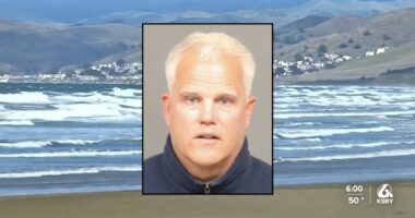 'I thought I was going to die': Paddleboarder holds female surfer underwater while calling her a 'f—ing b—' after he rammed her off her board, DA says