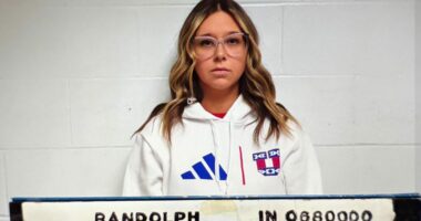 Indiana school secretary charged after husband finds her with student, probe reveals affair with another: cops