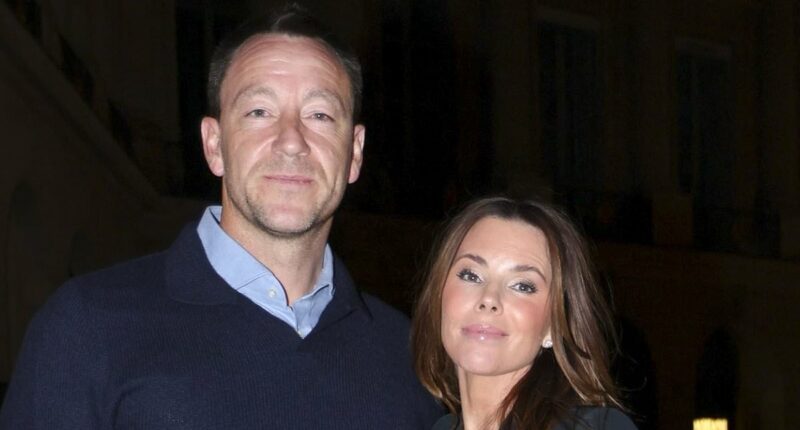 John Terry's wife Toni cuts a glam figure in a black minidress