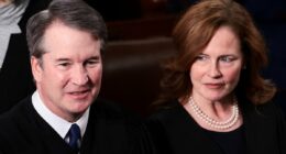 Justice Amy Coney Barrett's face says it all as Trump awkwardly blasts SCOTUS to their faces after very frosty welcome